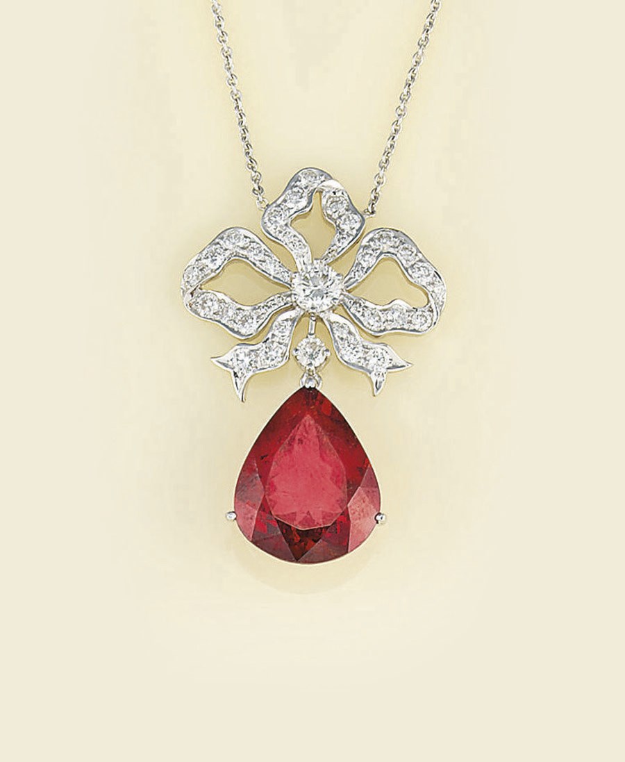 A DIAMOND AND SPESSARTINE GARNET NECKLACE