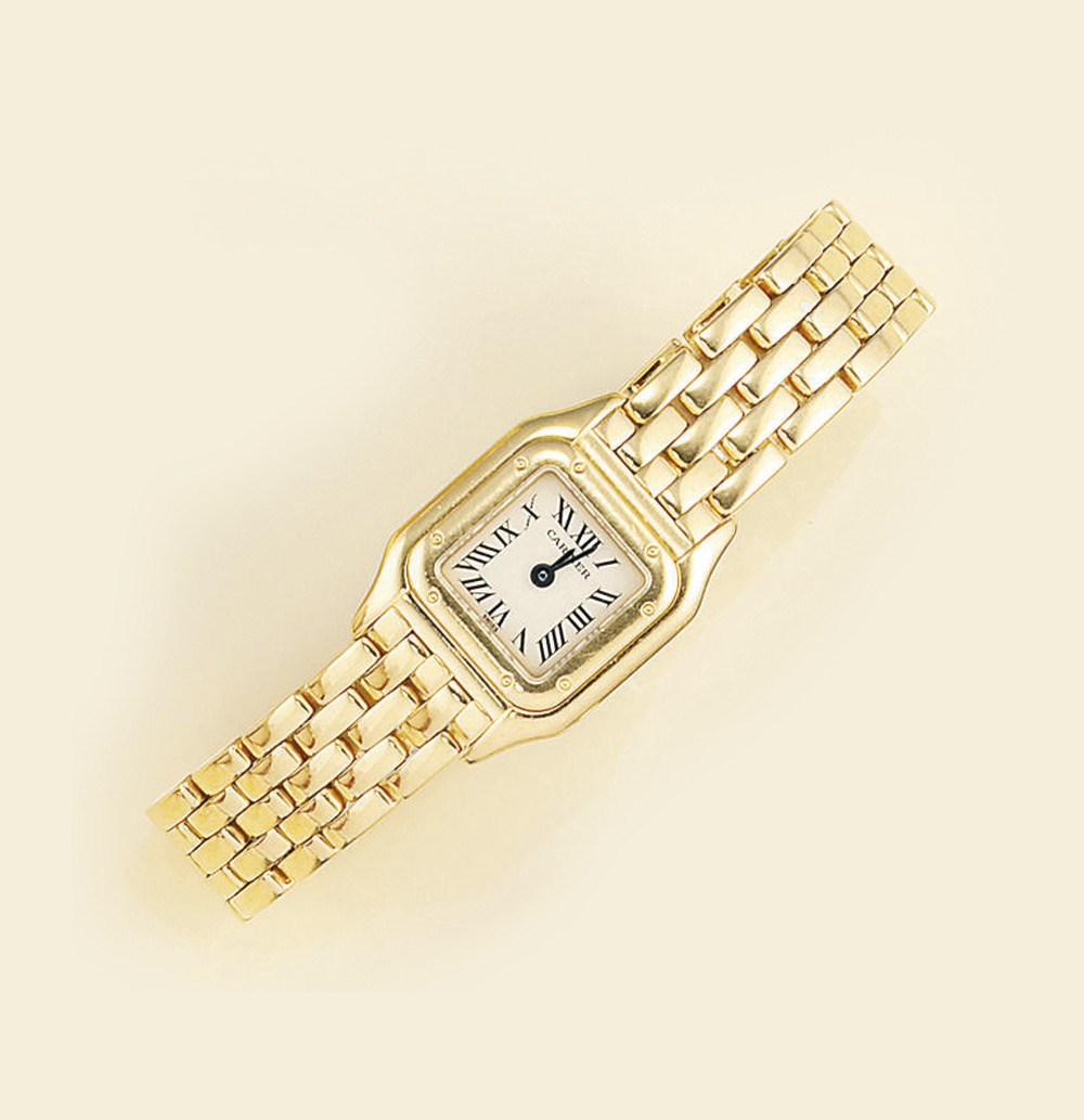 An 18ct. gold bracelet watch, by Cartier