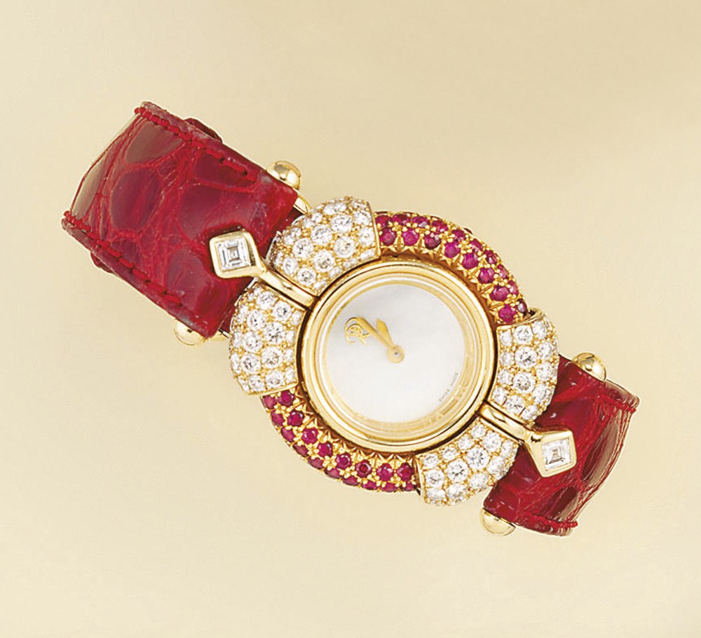 A lady's 18ct. gold diamond, ruby, sapphire and mother-of-pearl wristwatch, by Rene Boivin