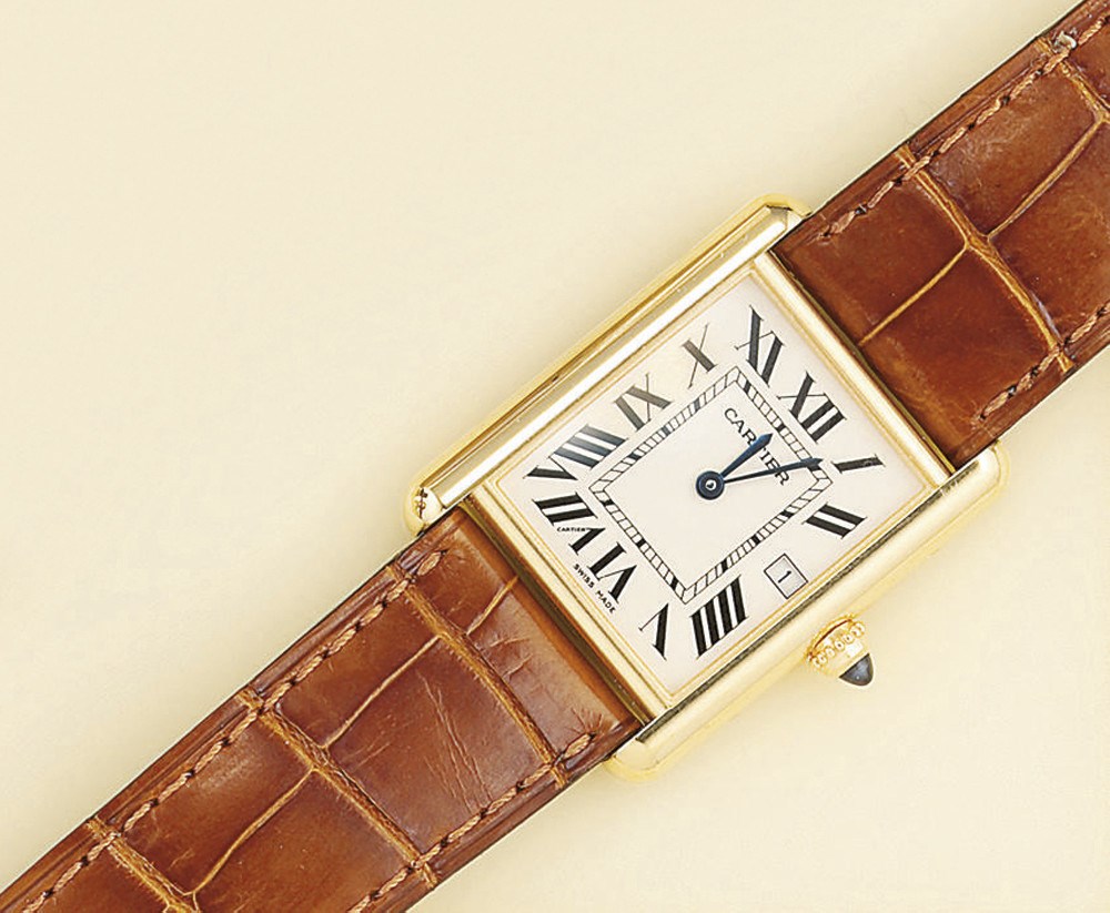 An 18ct. gold quartz "Tank" wristwatch, by Cartier