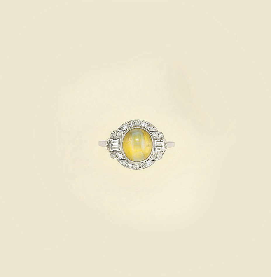 An Art Deco chrysoberyl cat's eye and diamond ring