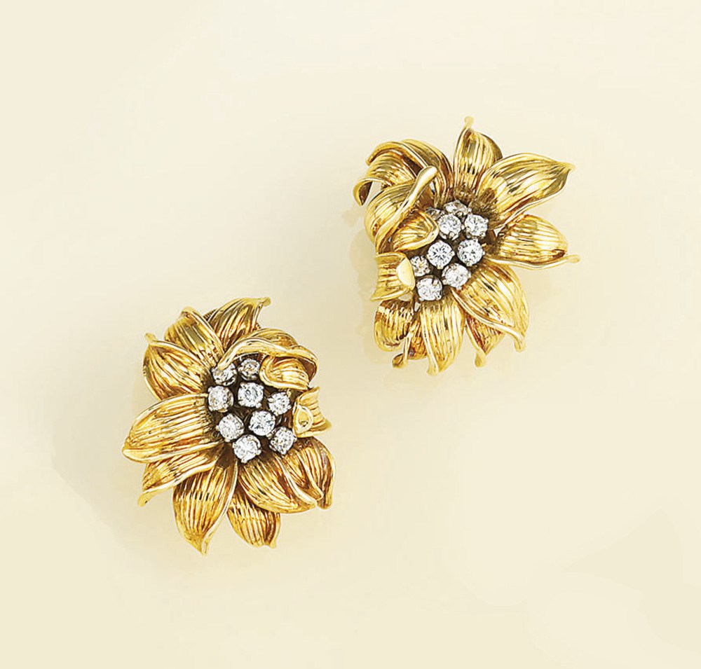 A pair of gold and diamond earlips, by Cartier