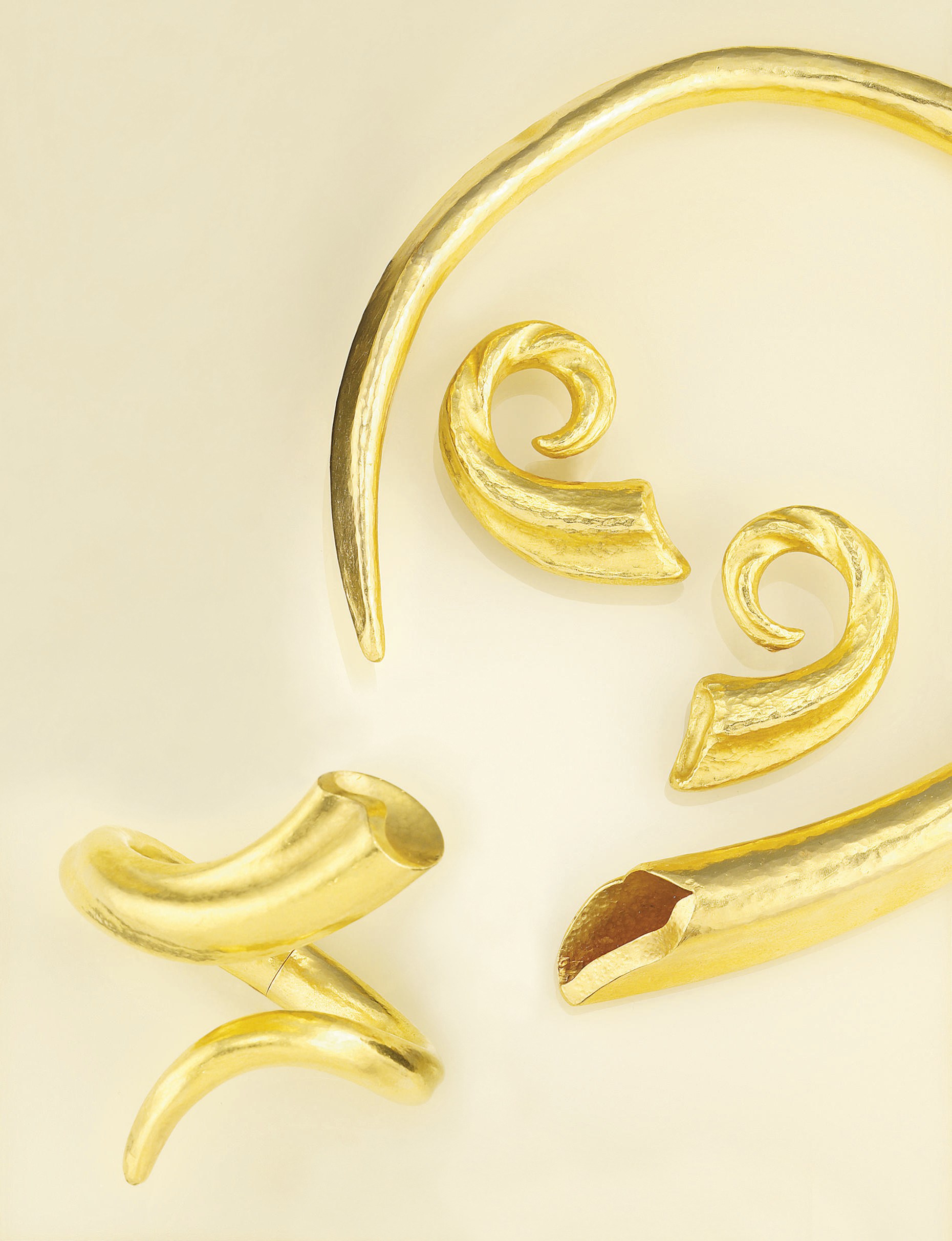 A necklace, bracelet and earclips, by Lalaounis