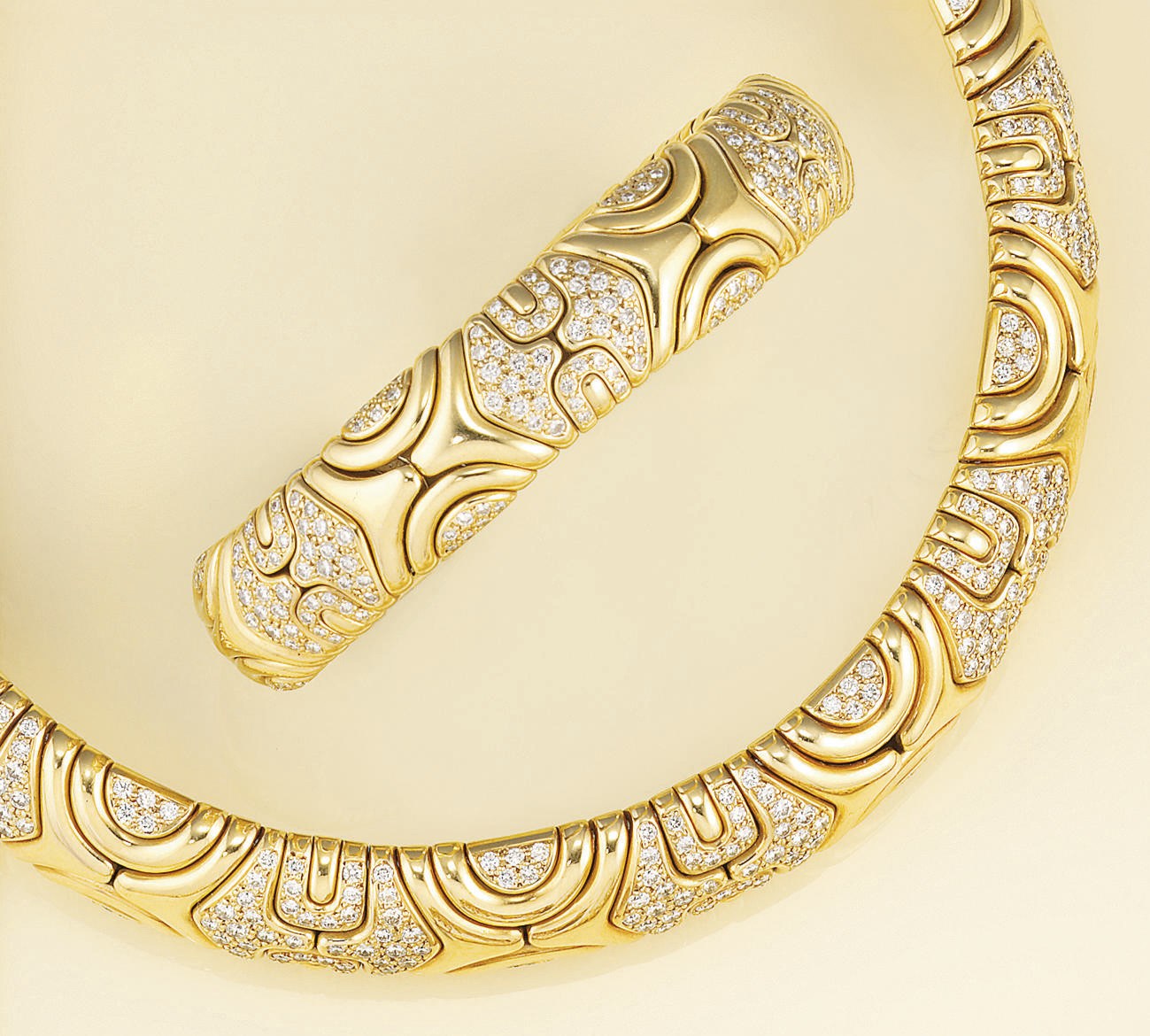 A diamond set necklace and bangle