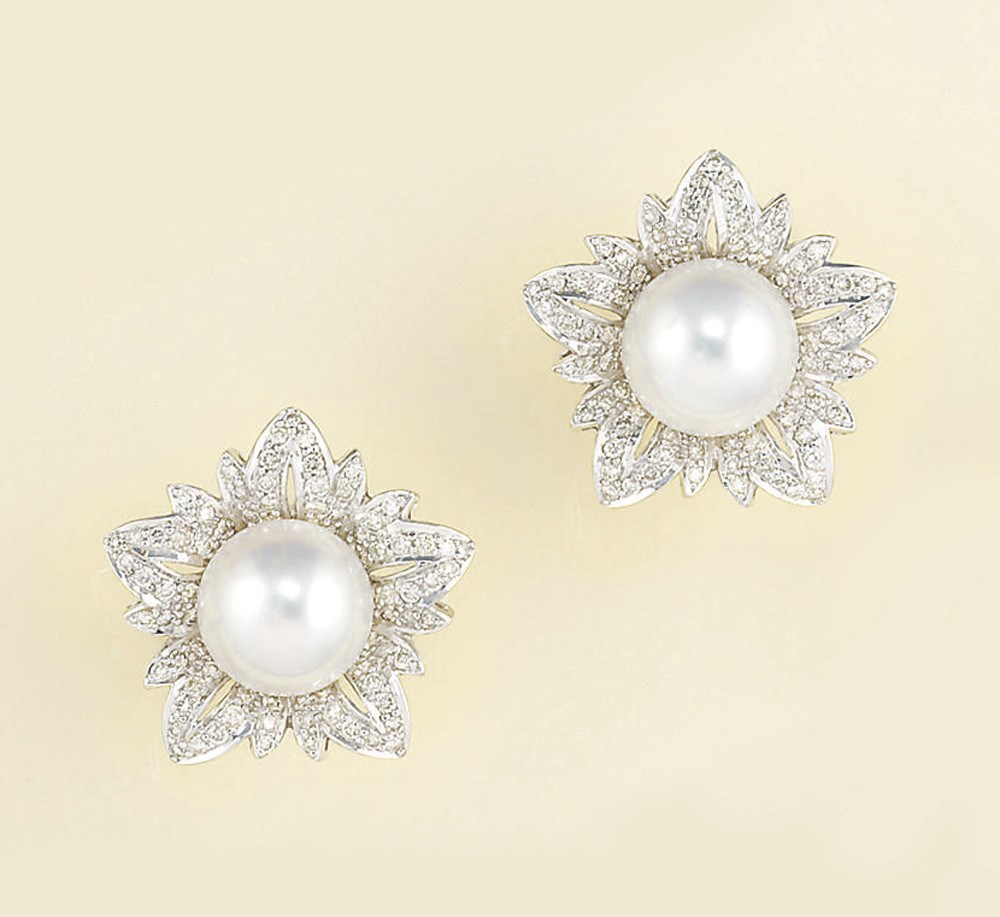 A pair of cultured pearl and diamond earclips