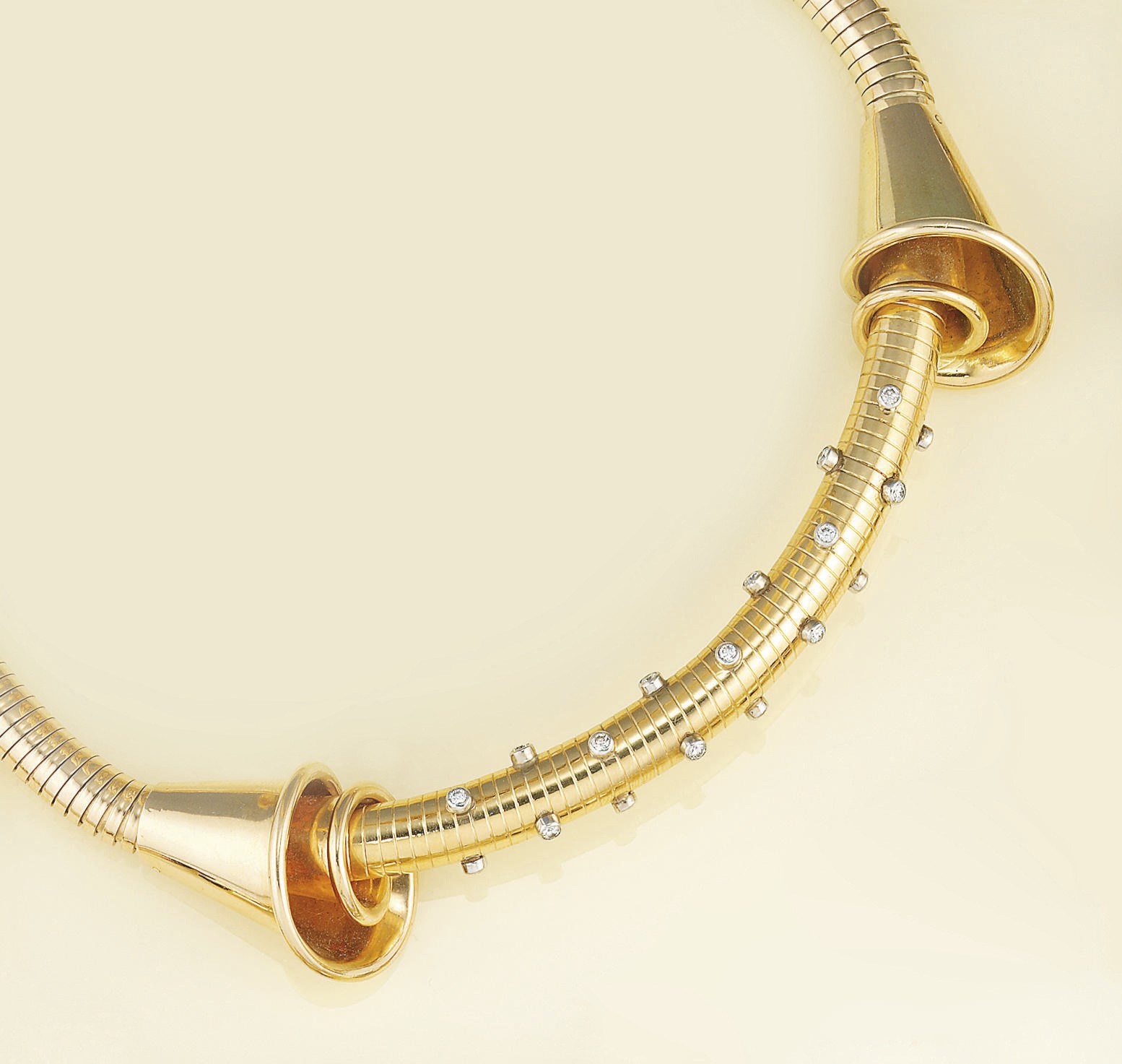A gold and diamond "gaspipe" collar necklace