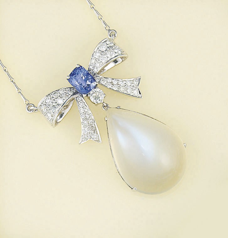 A moonstone, sapphire and diamond pendant necklace