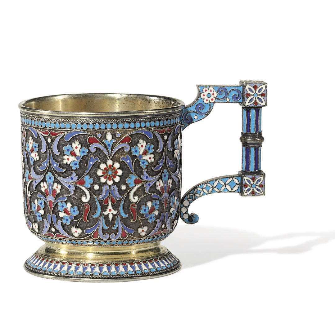 A SILVER-GILT AND CLOISONNÉ ENAMEL TEA GLASS HOLDER