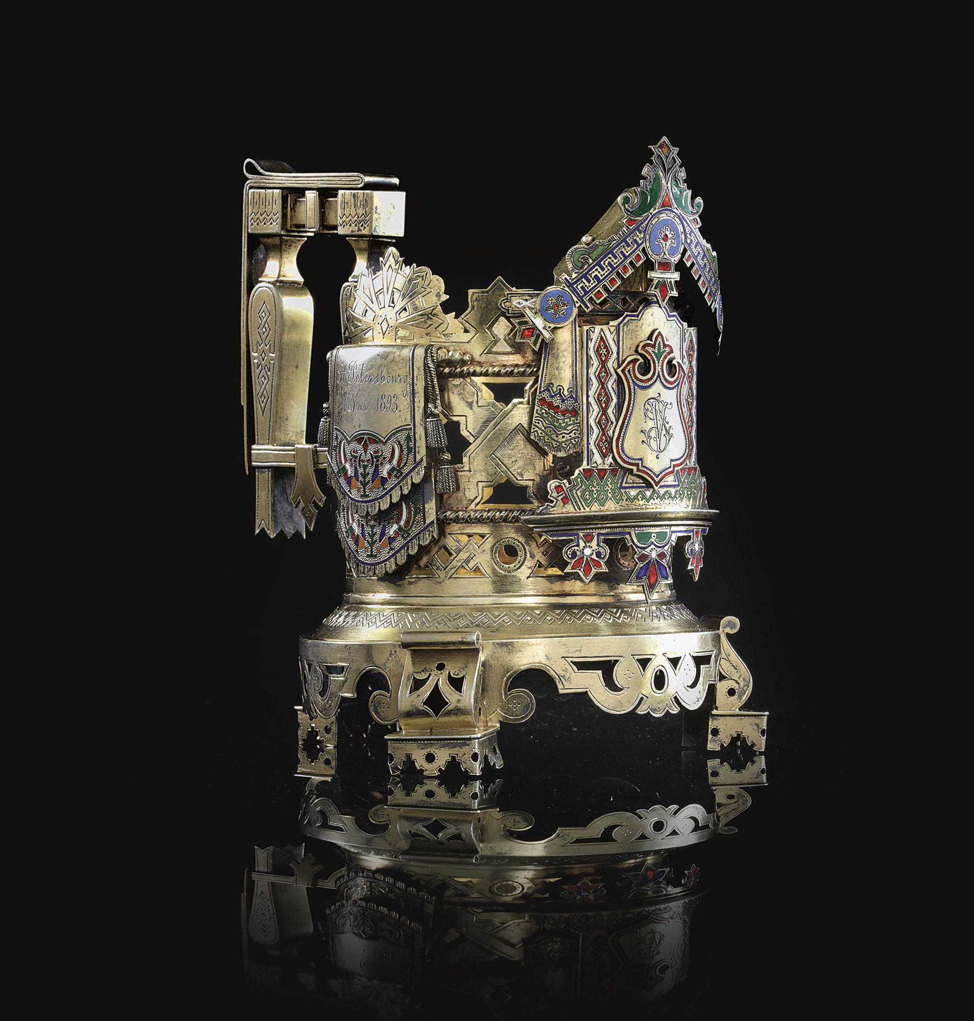 A SILVER-GILT AND CHAMPLEVÉ ENAMEL TEA GLASS HOLDER
