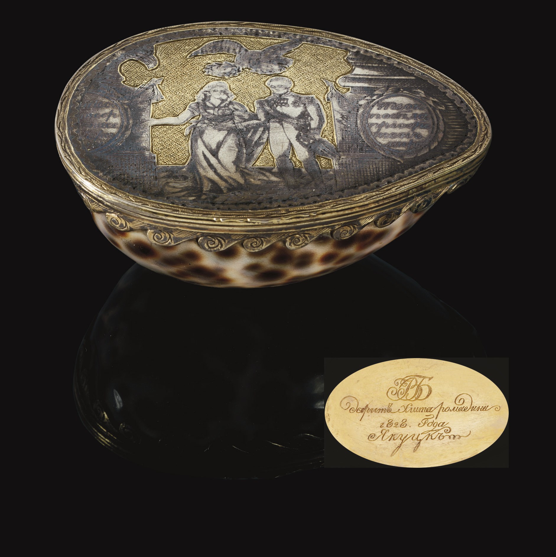 A PARCEL-GILT SILVER AND NIELLO COWRIE-SHELL BOX