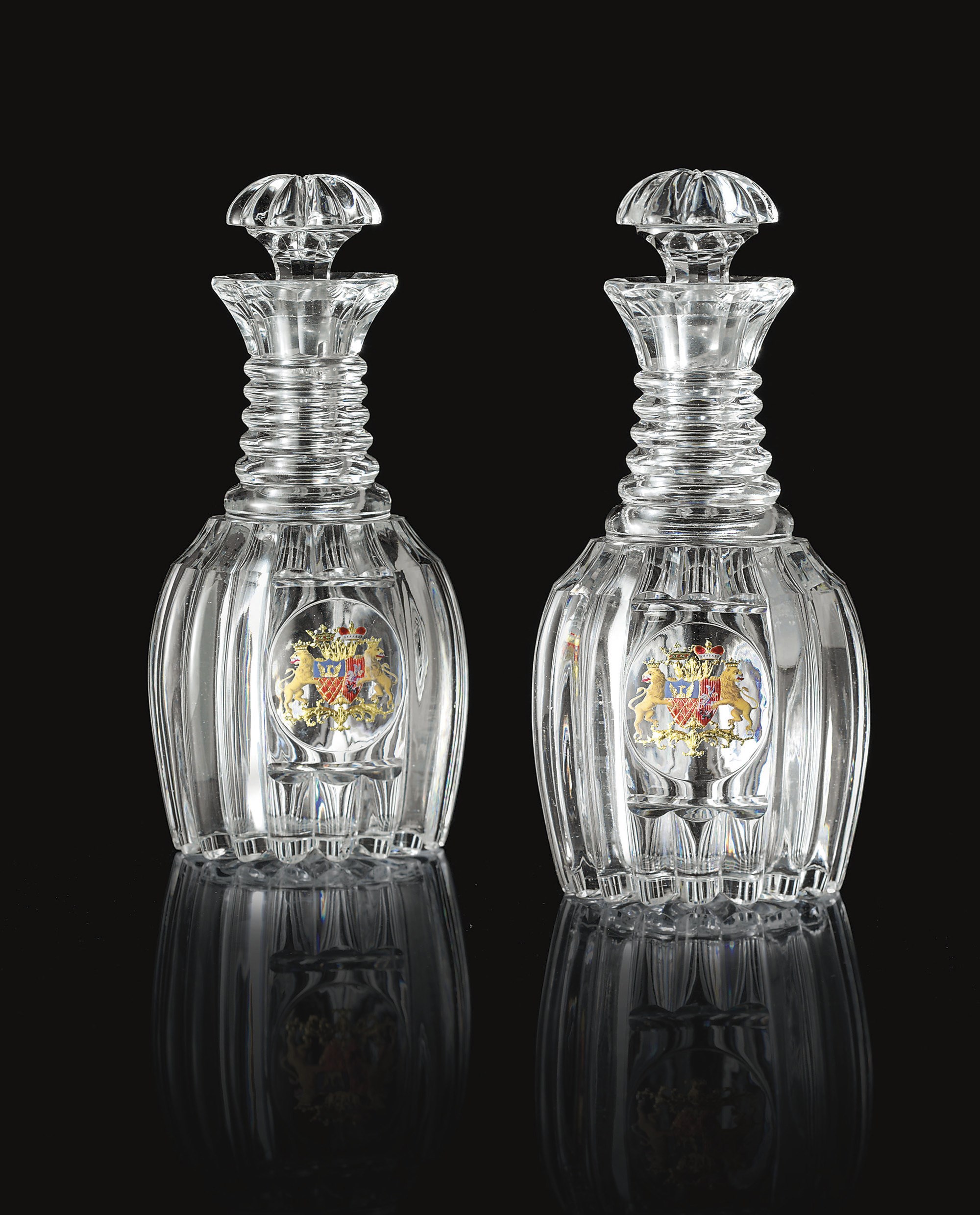 A Pair of Glass Decanters from a Banquet Service