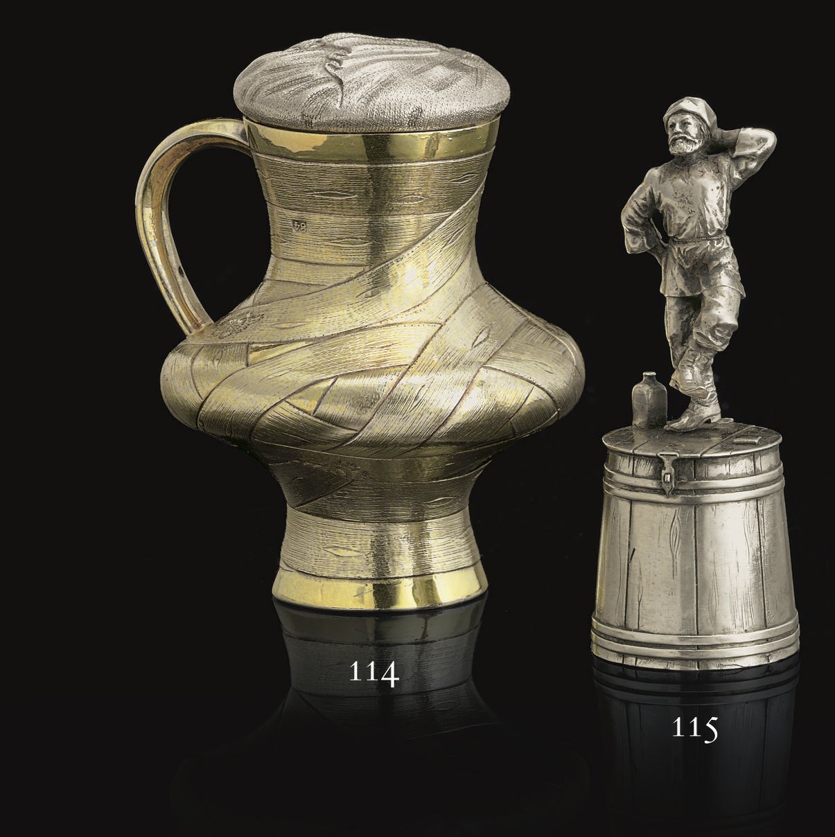 A Silver Trompe L'oeil Vodka Cup