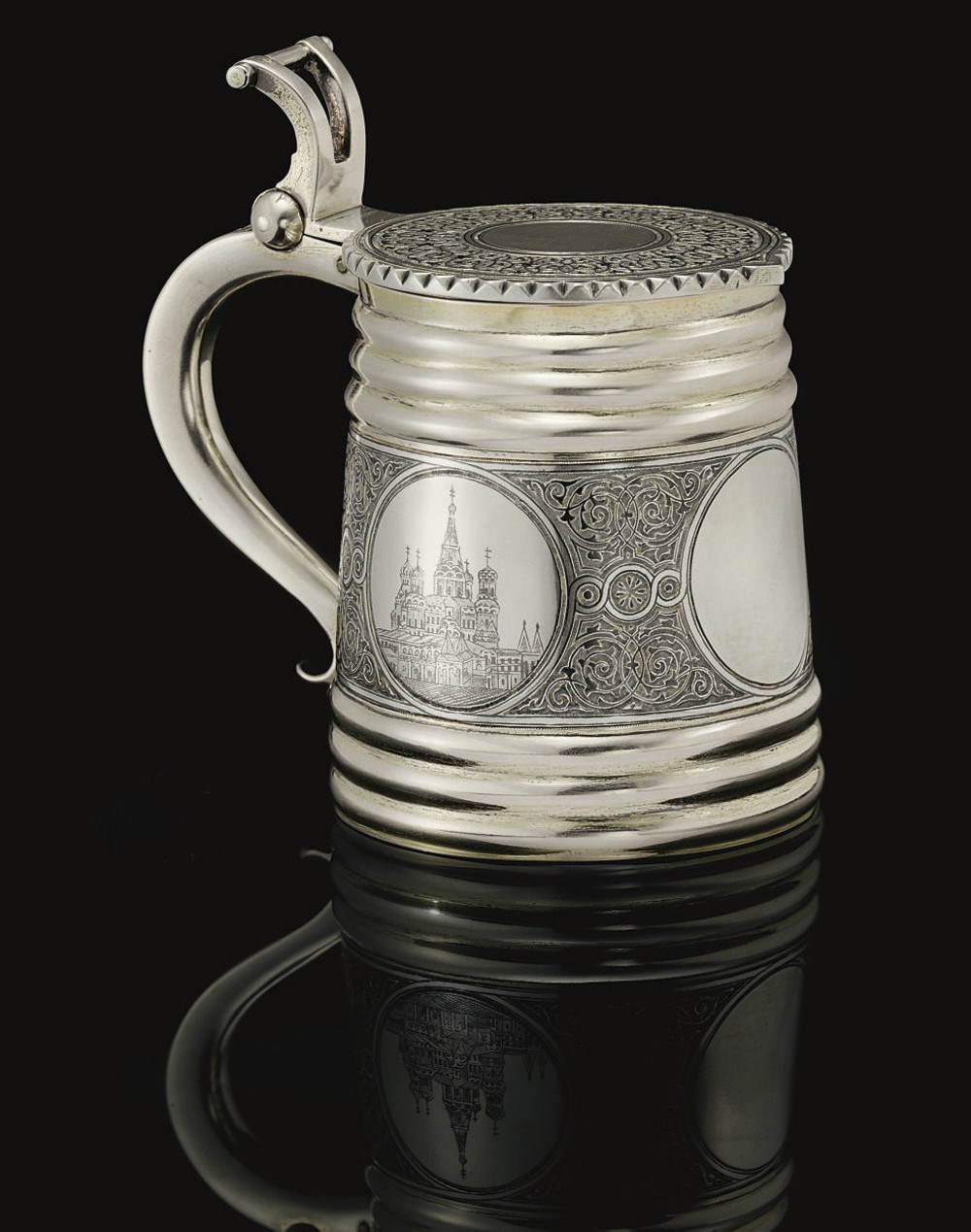 A Parcel-Gilt Silver and Niello Tankard