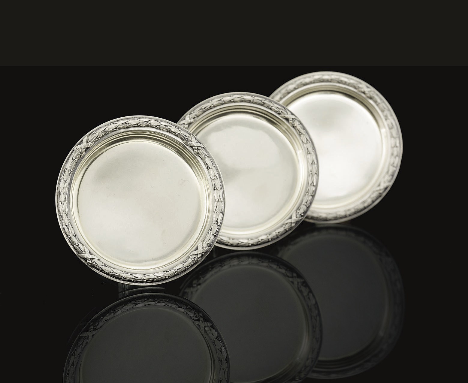 A Set of Three Silver Dishes