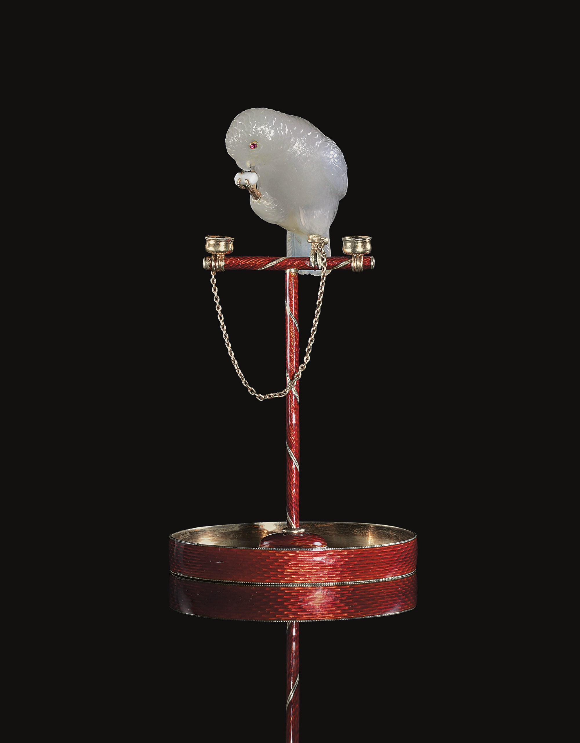 A Jeweled and Gold-Mounted Chalcedony Model of a Parrot on a Silver-Gilt and Guilloché Enamel Perch
