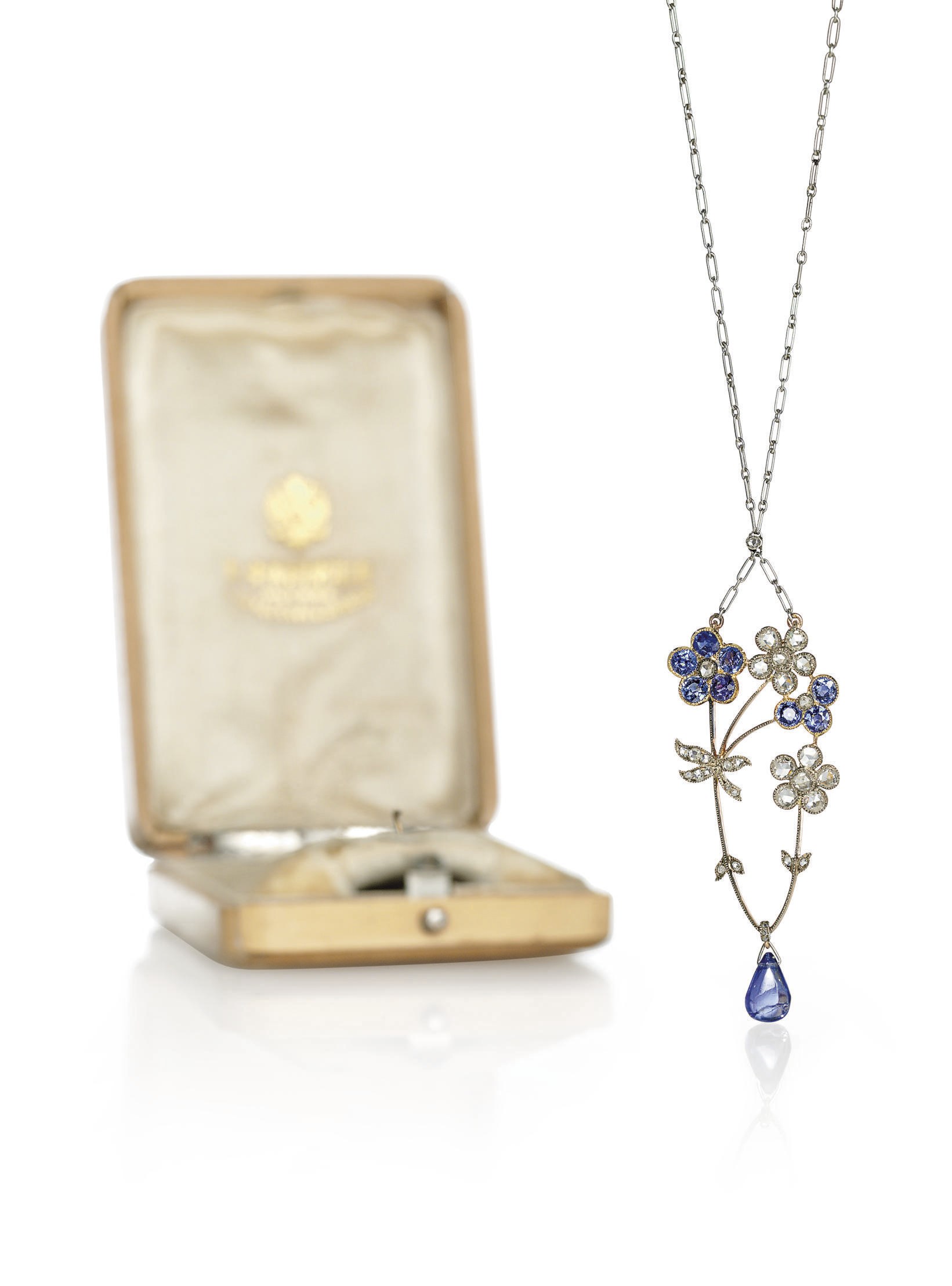 A Diamond, Sapphire and Gold Pendant