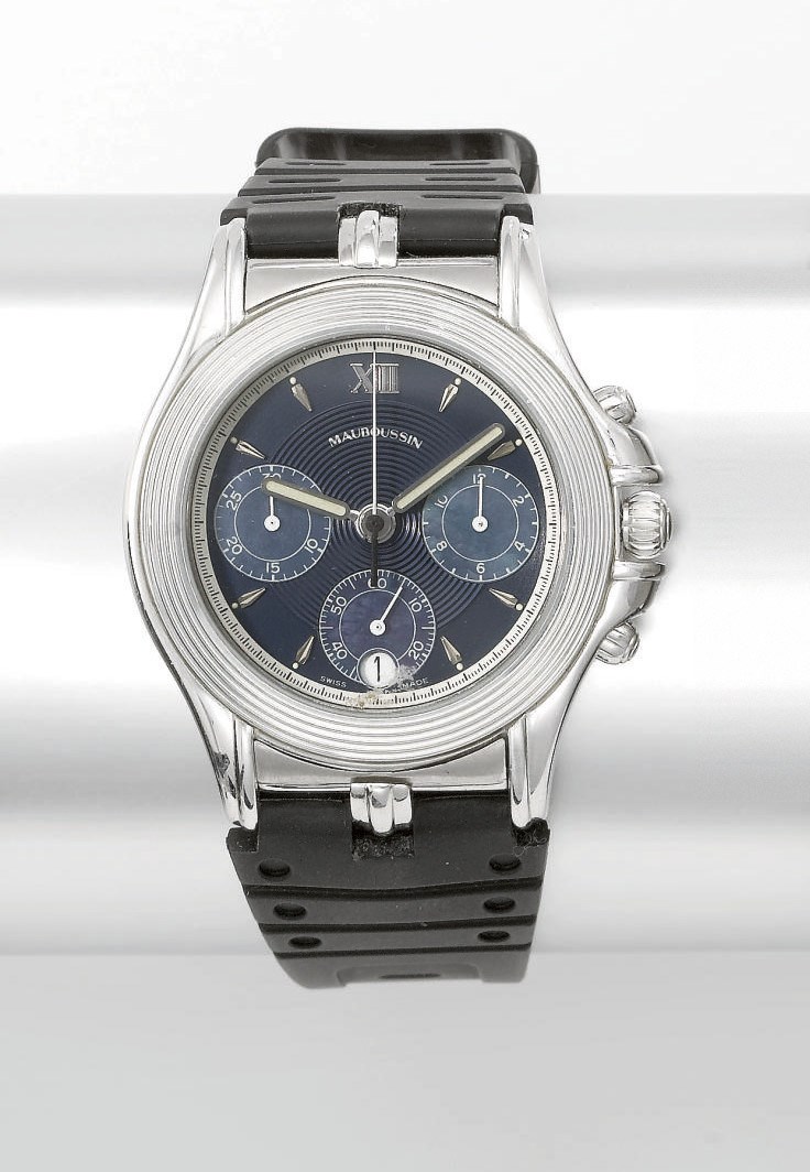 Mauboussin. An 18K white gold and mother-of-pearl chronograph wristwatch with date