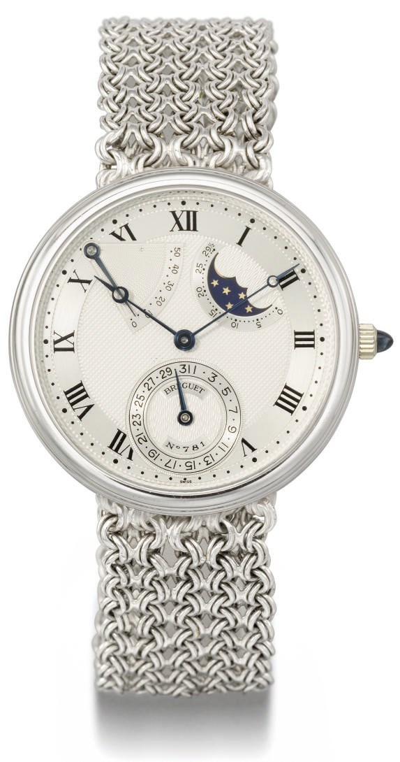 Breguet. An 18K white gold automatic wristwatch with power reserve, date, moon phases and bracelet