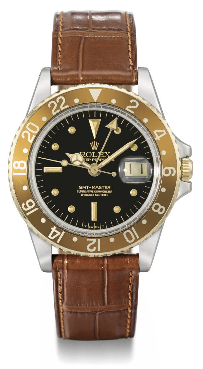 Rolex. A fine stainless steel and gold automatic dual time wristwatch with sweep centre seconds and date