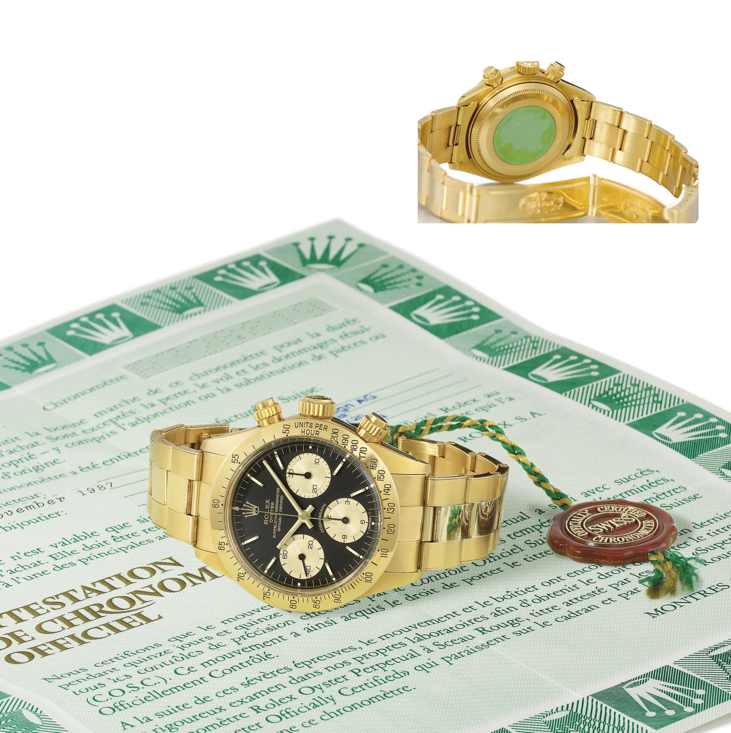 Rolex. A fine 18K gold chronograph wristwatch with bracelet, guarantee and box