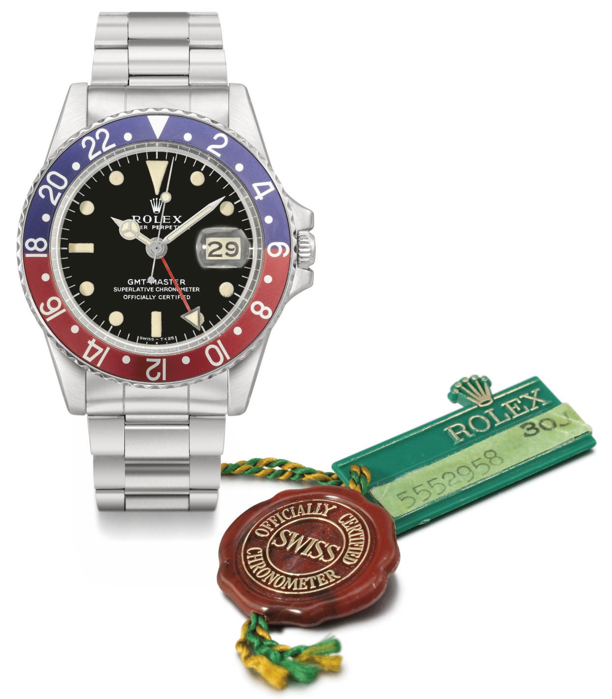 Rolex. A stainless steel automatic dual time wristwatch with sweep centre seconds, date, bracelet, original guarantee, tag and seal