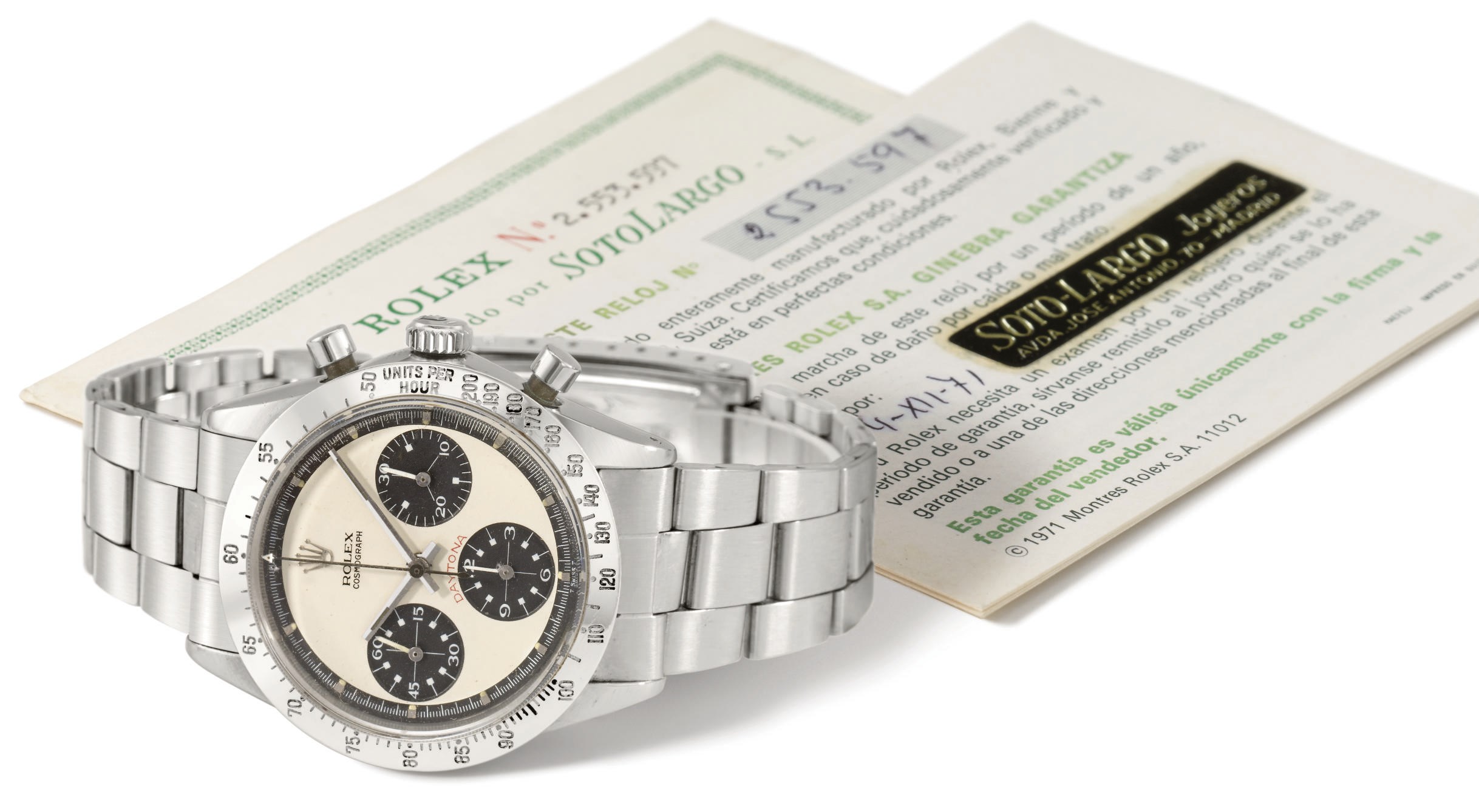 Rolex. A fine and rare stainless steel chronograph wristwatch with bracelet, original guarantee and box