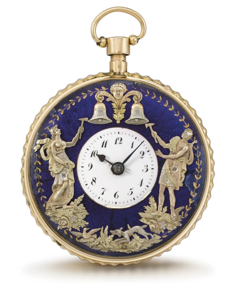Swiss. An 18K gold openface quarter repeating jaquemarts watch