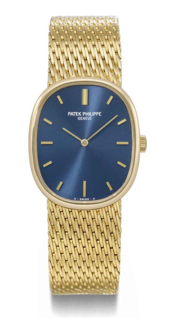 Patek Philippe. An 18K gold oval wristwatch with bracelet