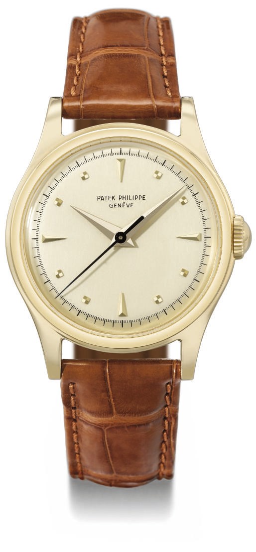 Patek Philippe. A fine and rare 18K gold wristwatch with sweep centre seconds