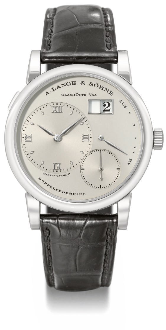 Lange & Söhne. A fine platinum twin barrel wristwatch with oversized date and power reserve