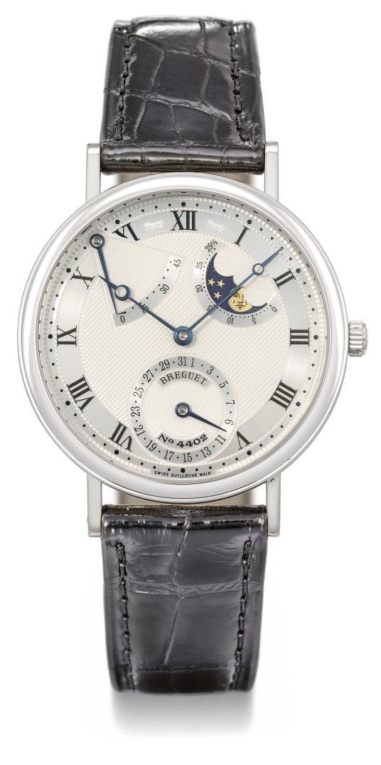 Breguet. A fine 18K white gold automatic wristwatch with date, power reserve and moon phases