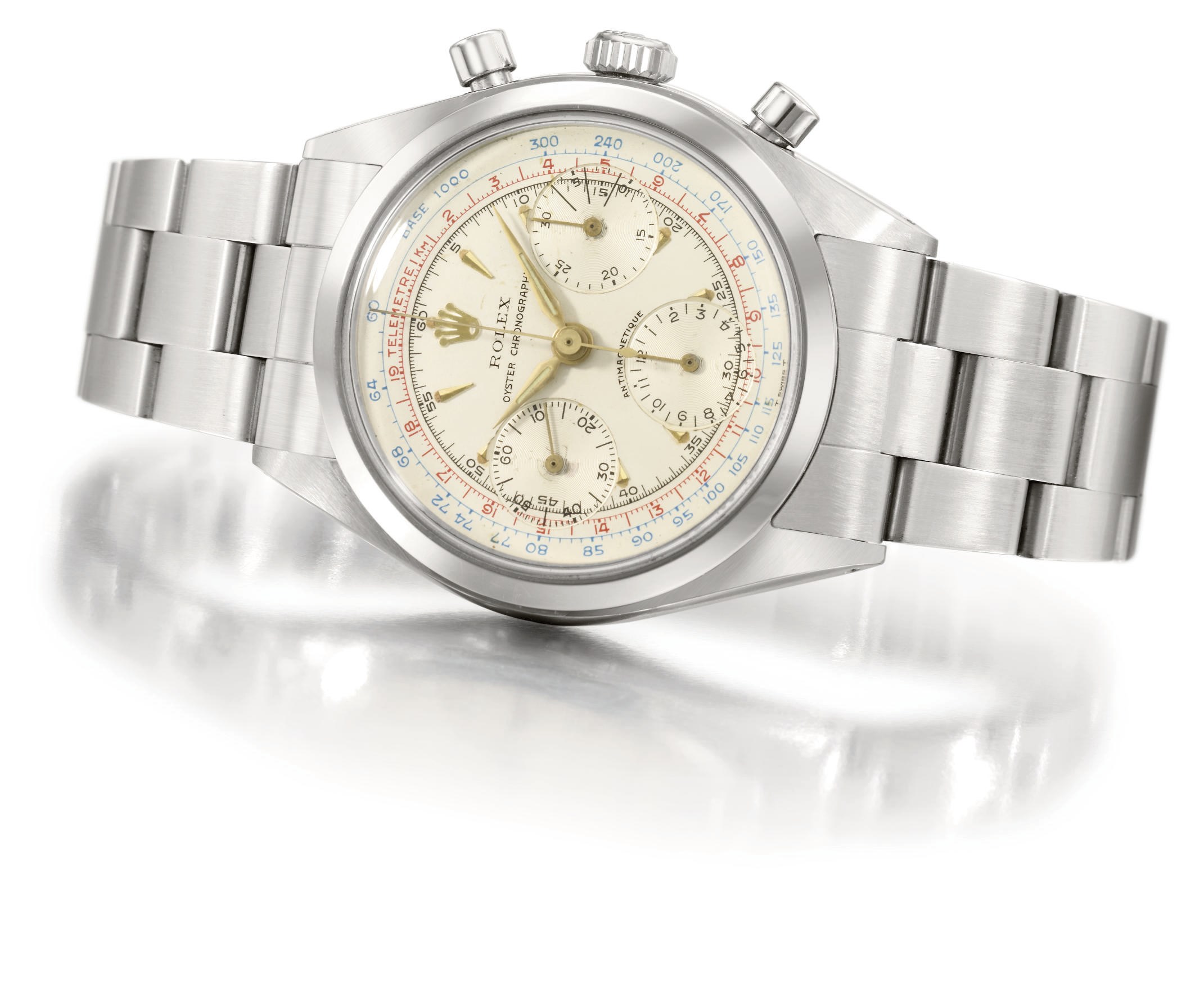 Rolex. A rare stainless steel chronograph wristwatch with bracelet and red telemetre and blue tachymetre scales