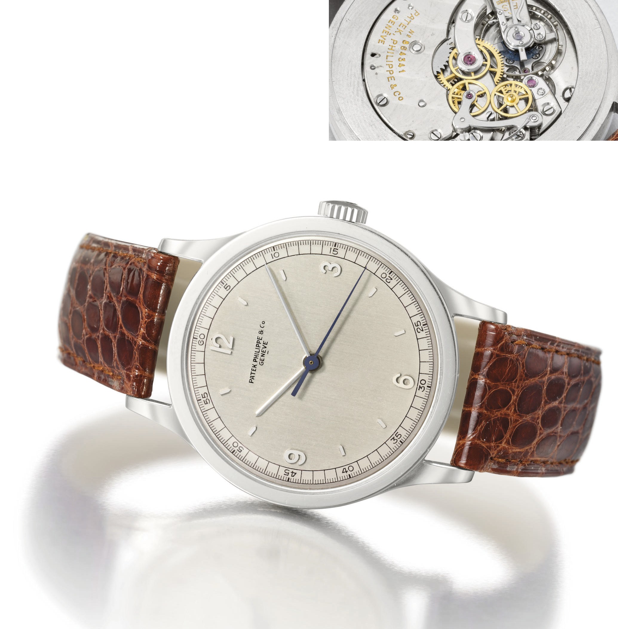 Patek Philippe. A very rare, large and attractive stainless steel wristwatch with indirect sweep centre seconds and unusual two-tone silvered "underline" dial