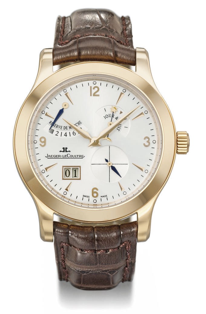 Jaeger-LeCoultre. An 18K pink gold twin barrel wristwatch with 8-day power reserve, day and night display and date