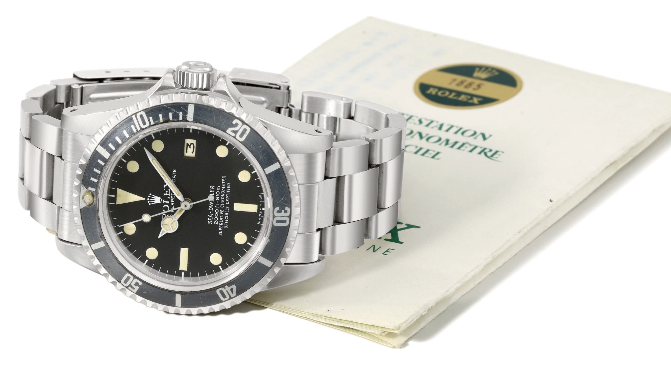 Rolex. A stainless steel automatic wristwatch with sweep centre seconds, date, bracelet and original guarantee