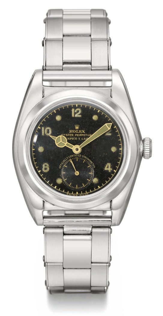 Rolex. An unusual stainless steel automatic bubble back wristwatch with black dial and bracelet