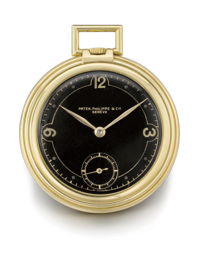 Patek Philippe. An unusual and rare 18K gold openface keyless lever watch with black dial