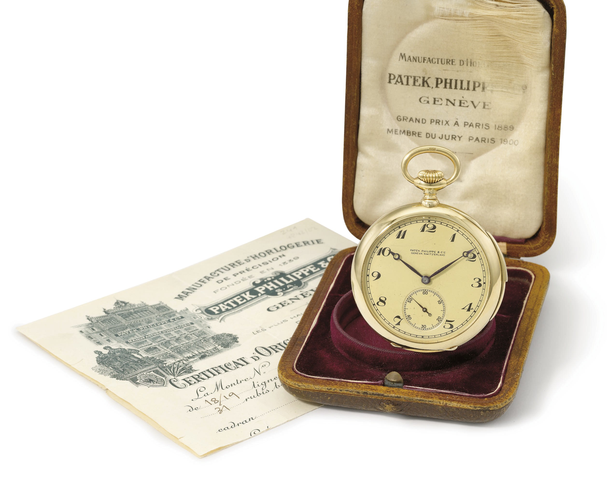 Patek Philippe. A fine 18K openface quarter repeating keyless lever watch with original certificate and box
