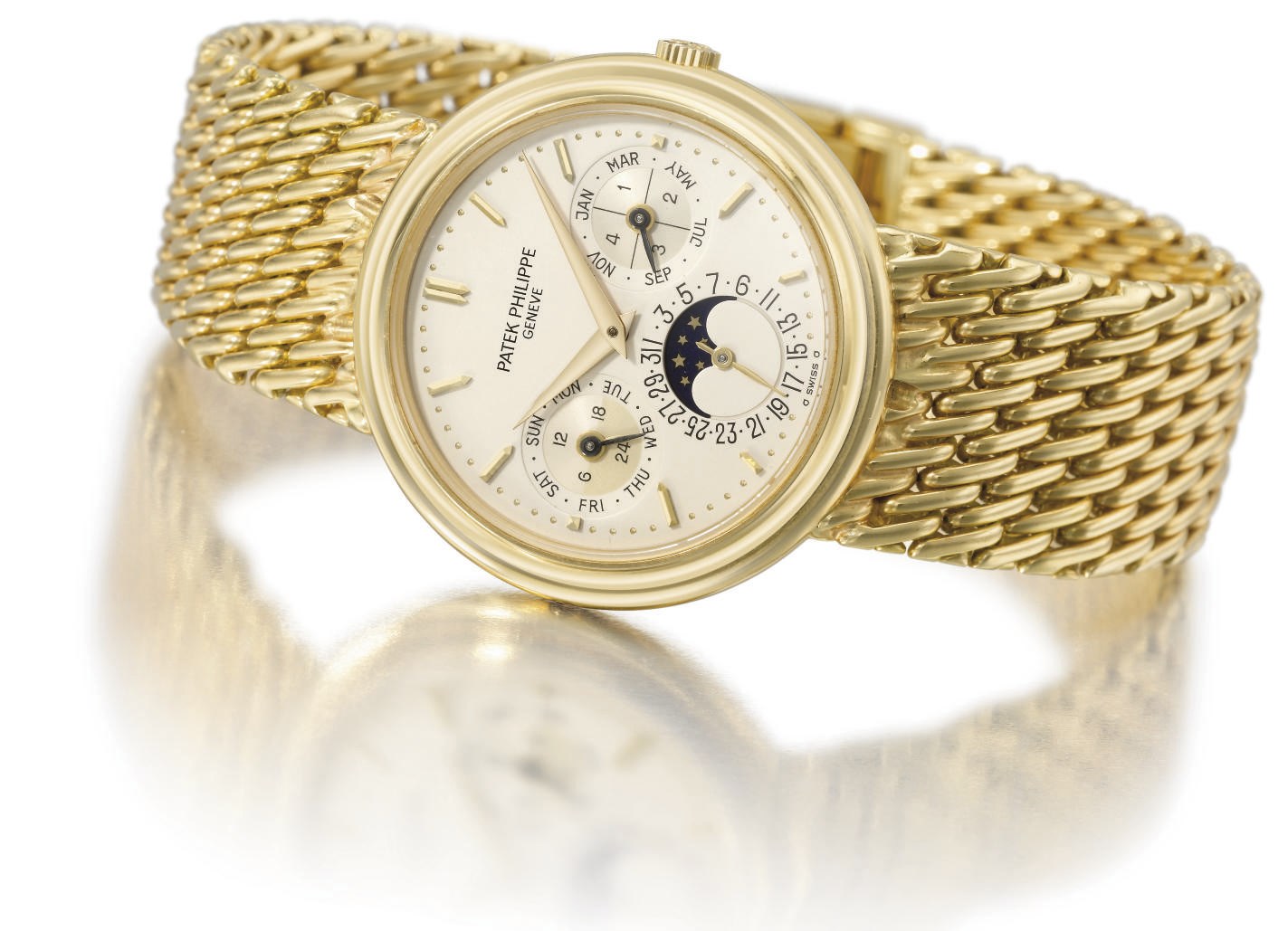 Patek Philippe. A fine 18K gold automatic perpetual calendar wristwatch with moon phases and bracelet