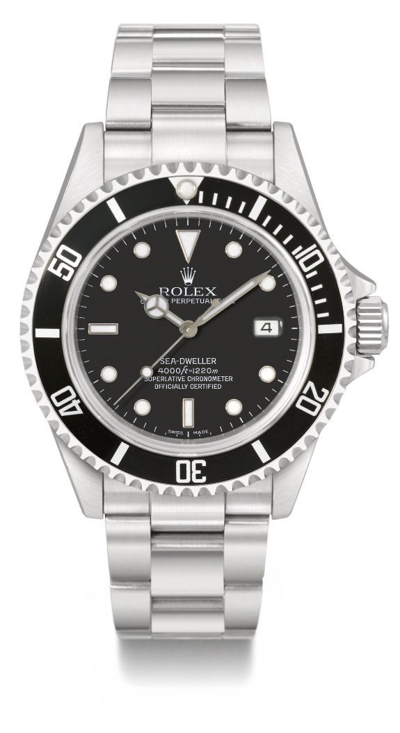 Rolex. A stainless steel automatic wristwatch with date, bracelet, original guarantee and box