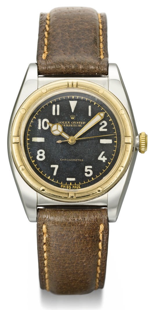 Rolex. An attractive stainless steel and gold automatic bubble back wristwatch with sweep centre seconds and black dial