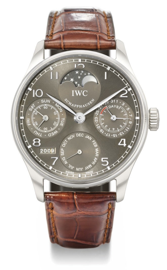 IWC. A rare and oversized 18K white gold automatic perpetual calendar wristwatch with 7-day power reserve and moon phases