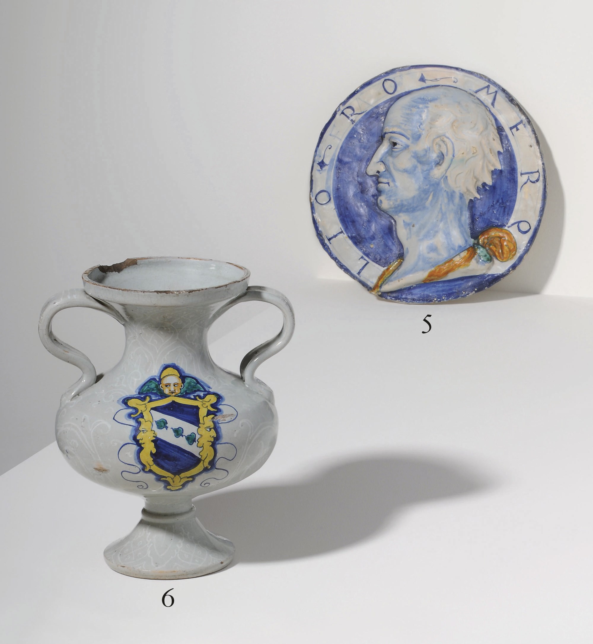 AN ITALIAN MAIOLICA ARMORIAL TWO-HANDLED VASE