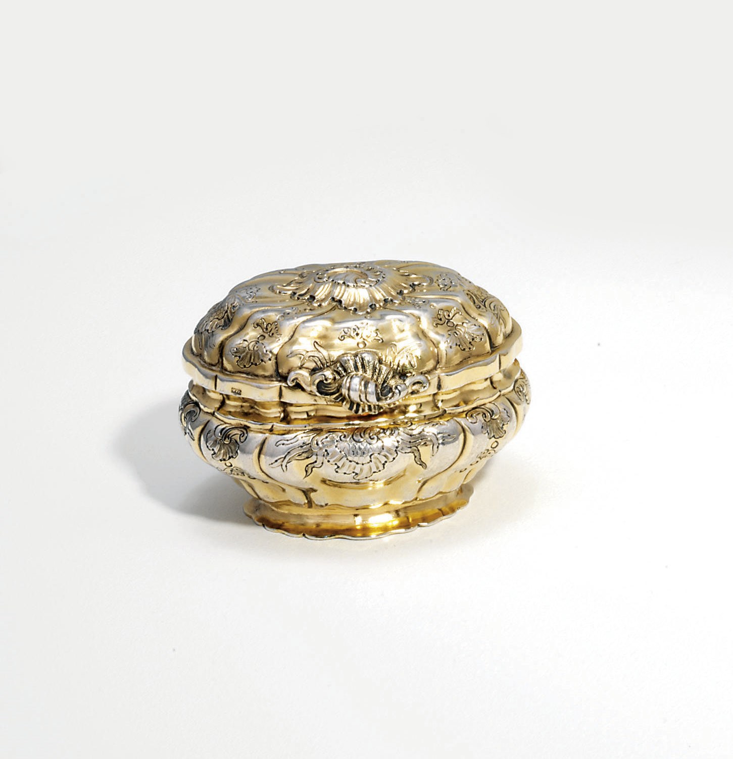 A GERMAN SILVER-GILT DRESSING-TABLE BOX