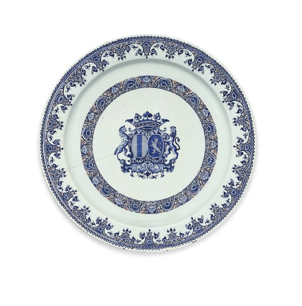 A ROUEN FAIENCE ARMORIAL CHARGER