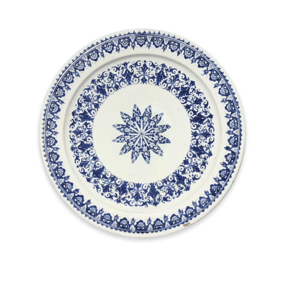 A ROUEN FAIENCE BLUE AND WHITE CHARGER