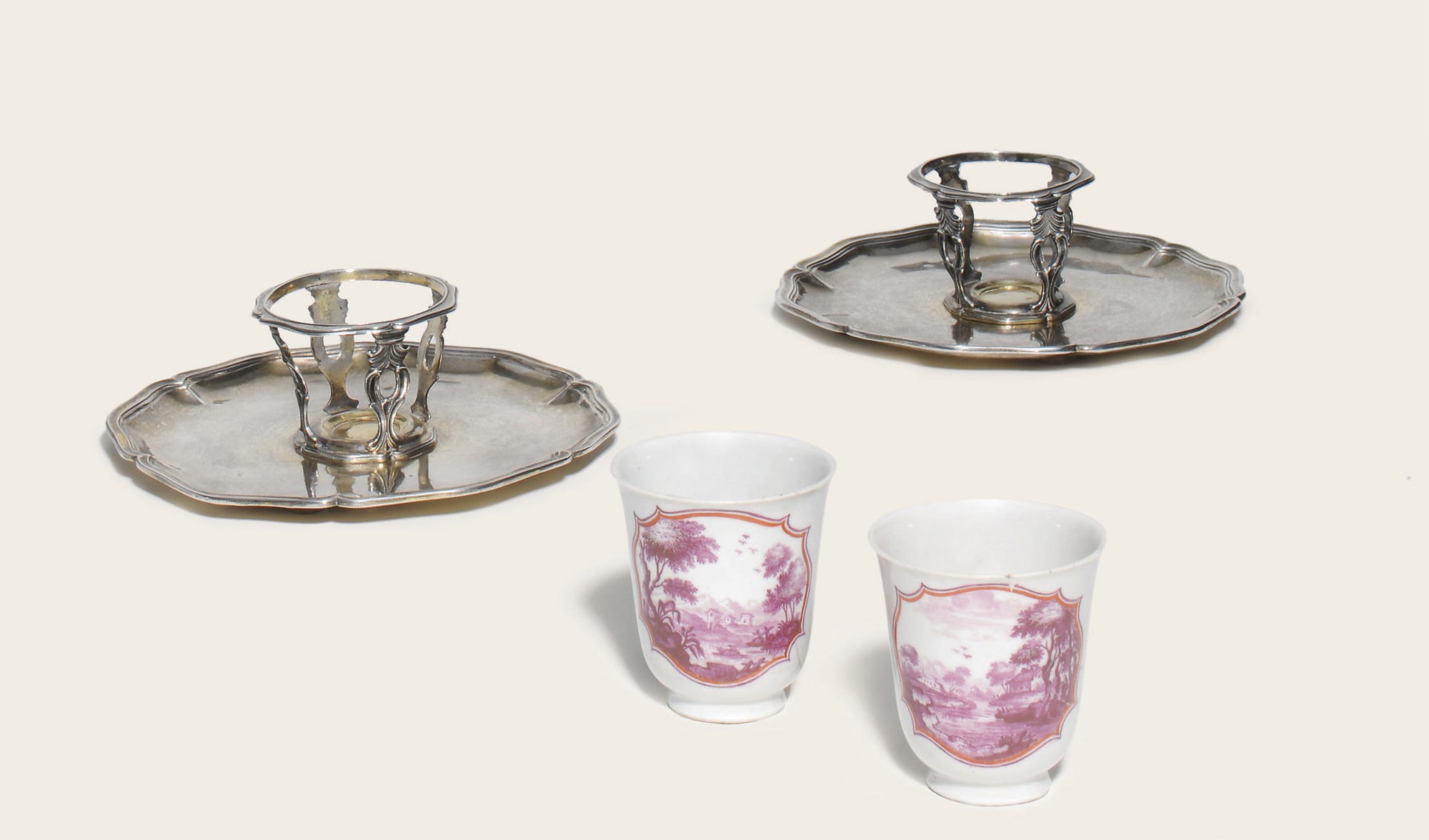 A PAIR OF DOCCIA PORCELAIN BEAKERS AND A PAIR OF SILVER MANCERINAS