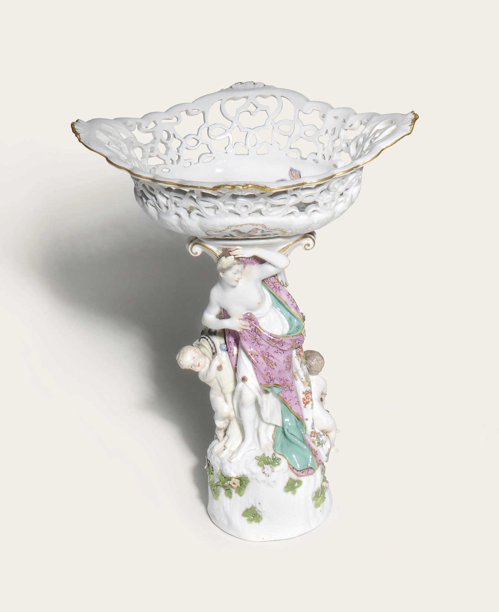A MEISSEN PORCELAIN CENTREPIECE EMBLEMATIC OF SPRING AND SUMMER