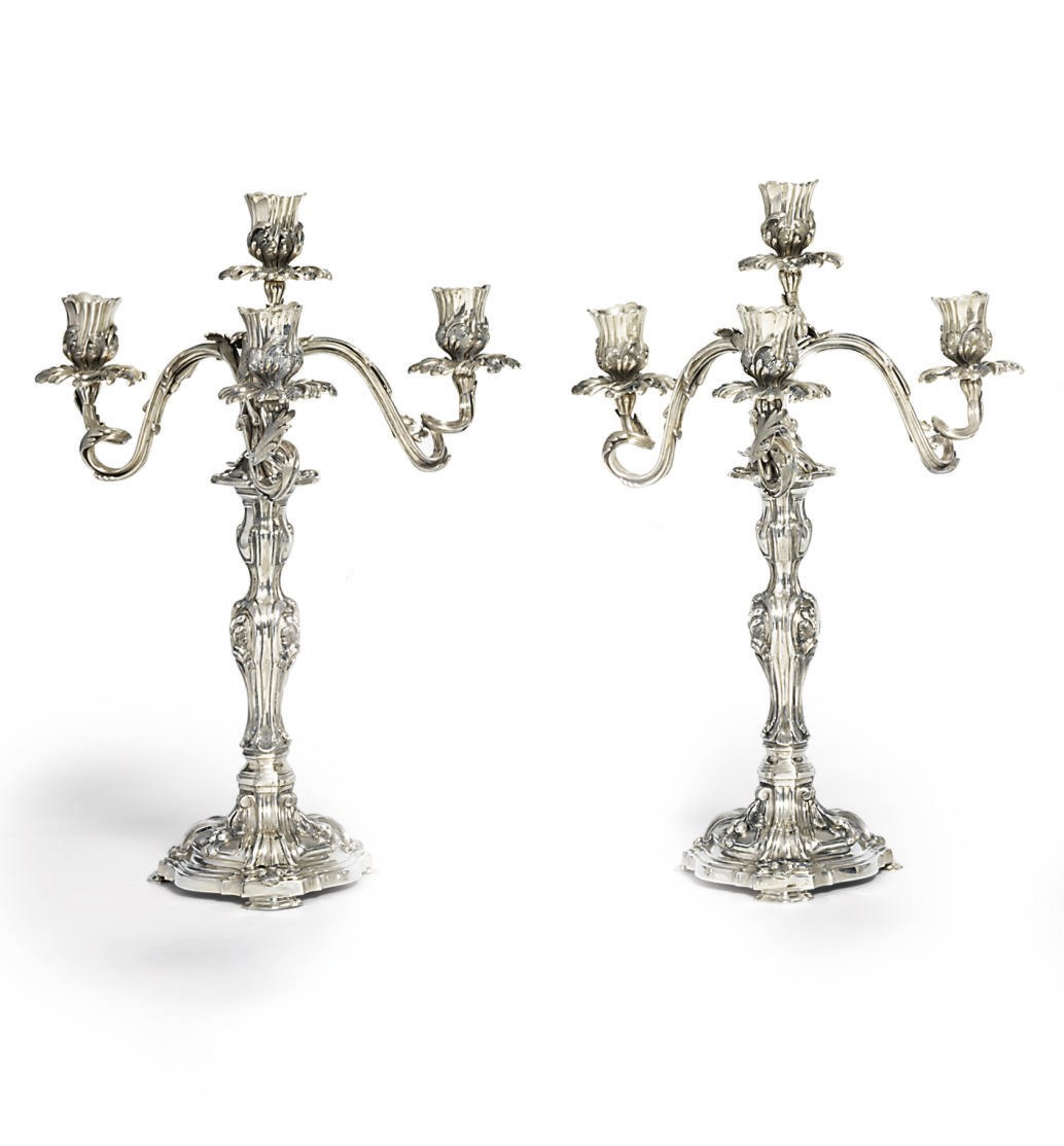 A PAIR OF PORTUGUESE SILVER FOUR-LIGHT CANDELABRA