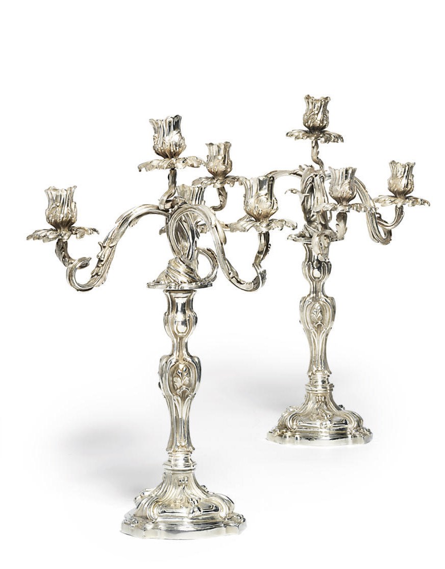 A PAIR OF CONTINENTAL SILVER FOUR-LIGHT CANDELABRA